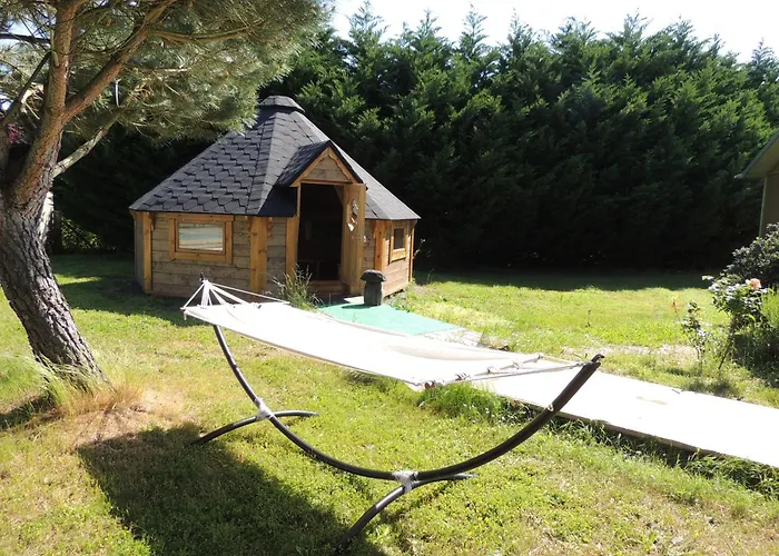CHALET ATYPIQUE KOTA NOAH location en gîte salle d'eau privative à 20m